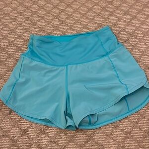Lululemon high rise speed up cyan shorts.